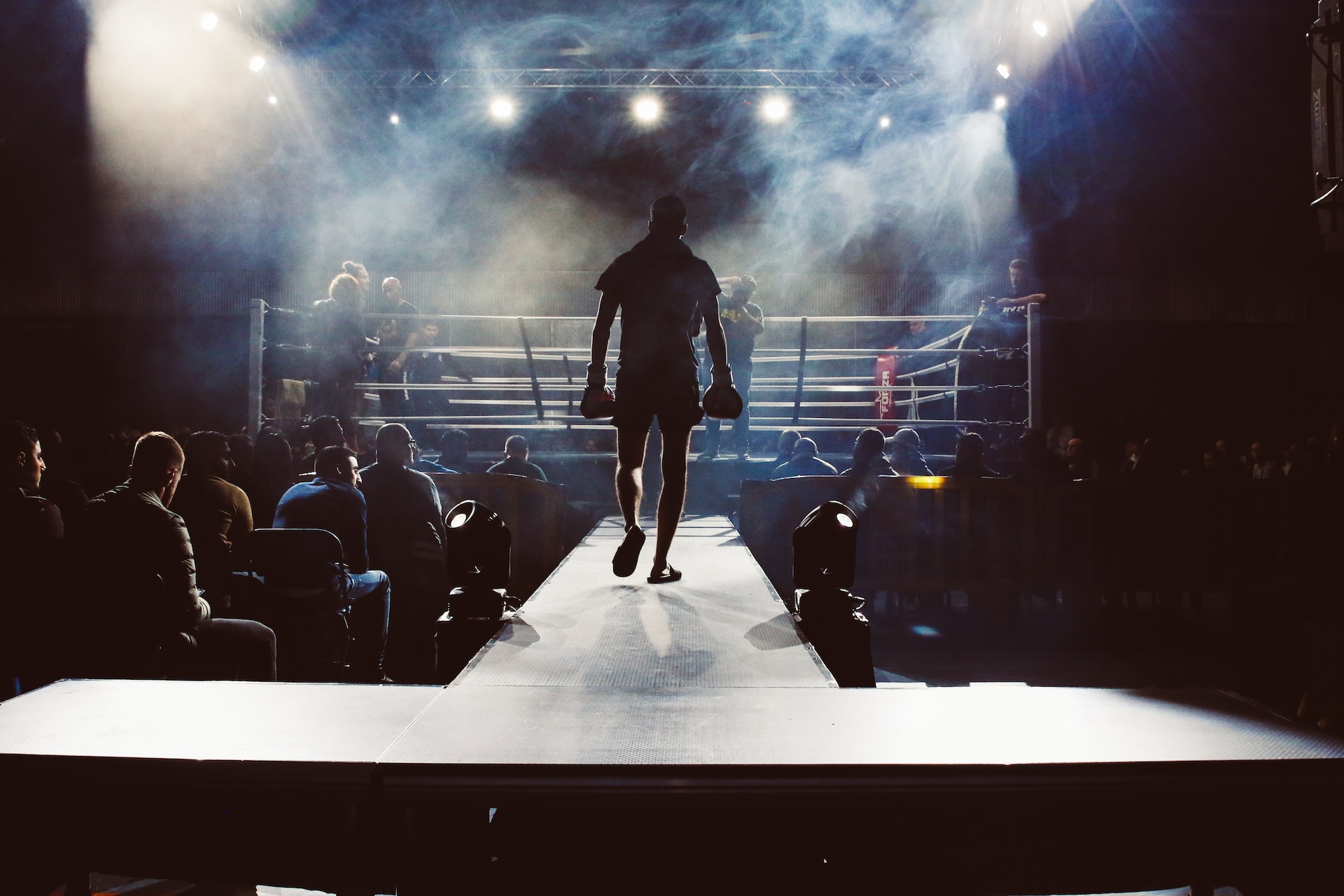 Image of boxer's silhouette entering the ring to convey the need for Boxing Recovery Queens NY - ProMet PT