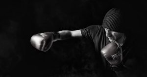 Image of a boxer fighting to convey the benefits of Therapy for Boxing - ProMetPT